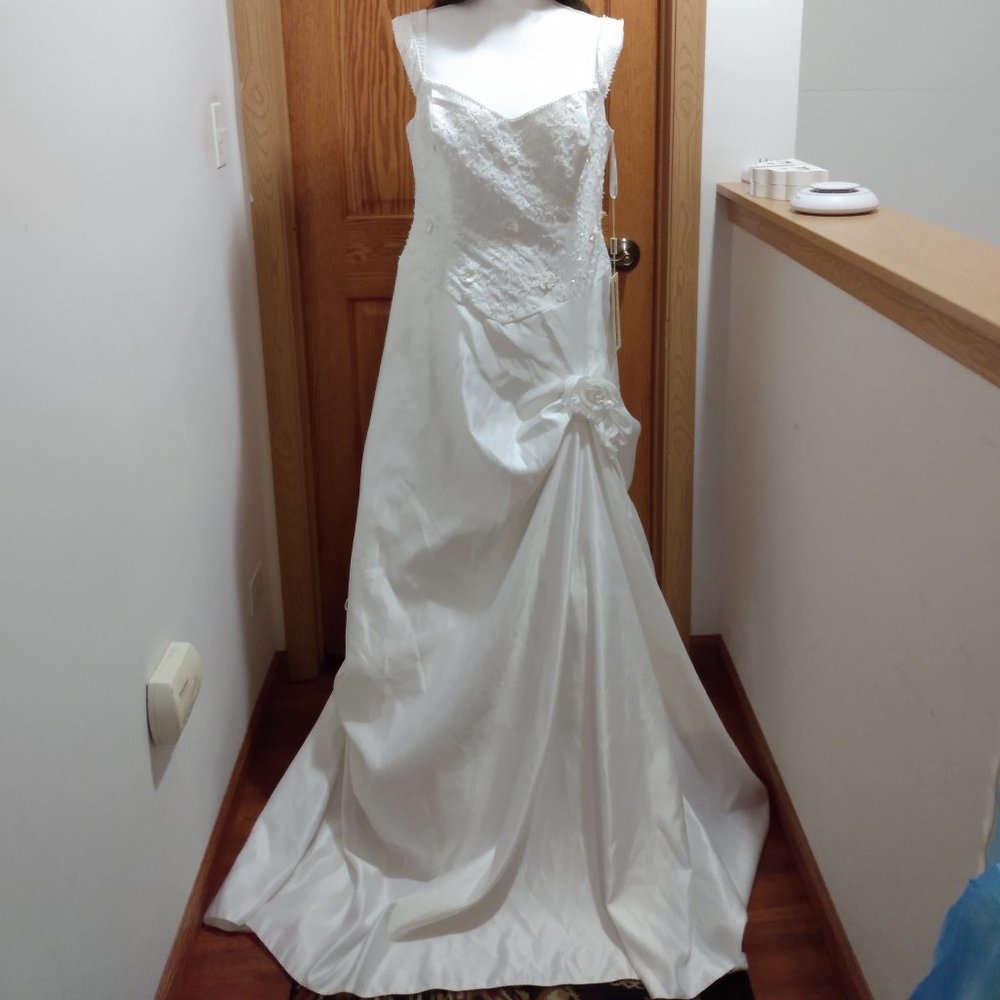 Andy Anand vintage, ball gown.Beaded bodice and pick-ups and rosettes on skirt.